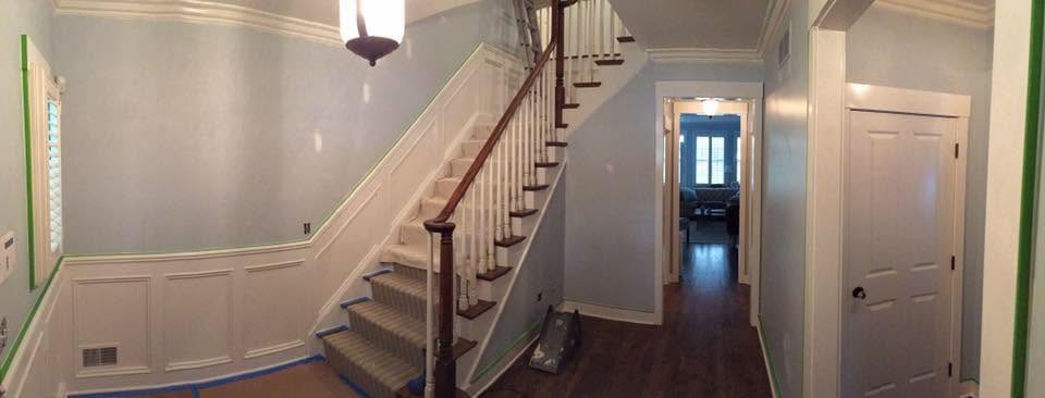 Interior staircase and walls prepared for repair and painting