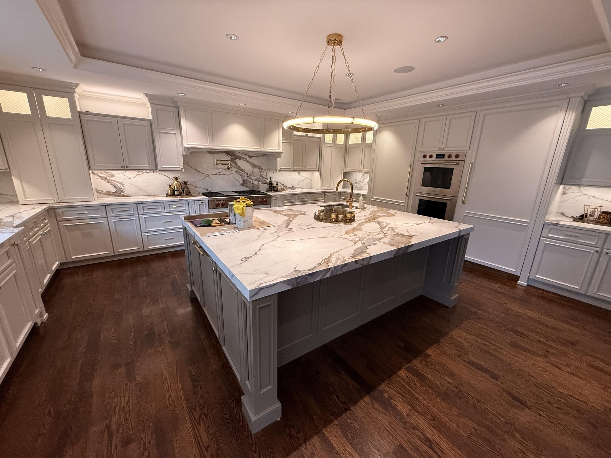 Finished gray cabinets with detailed crown molding in a Metro Detroit kitchen
